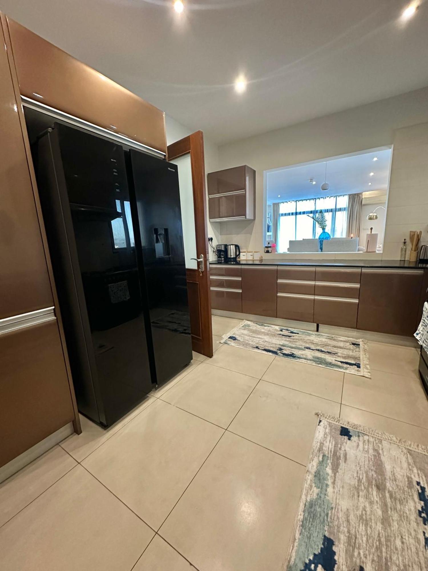 Coastalhome 75Inch Tv 5Min Drive To The City & Beach دار السلام المظهر الخارجي الصورة